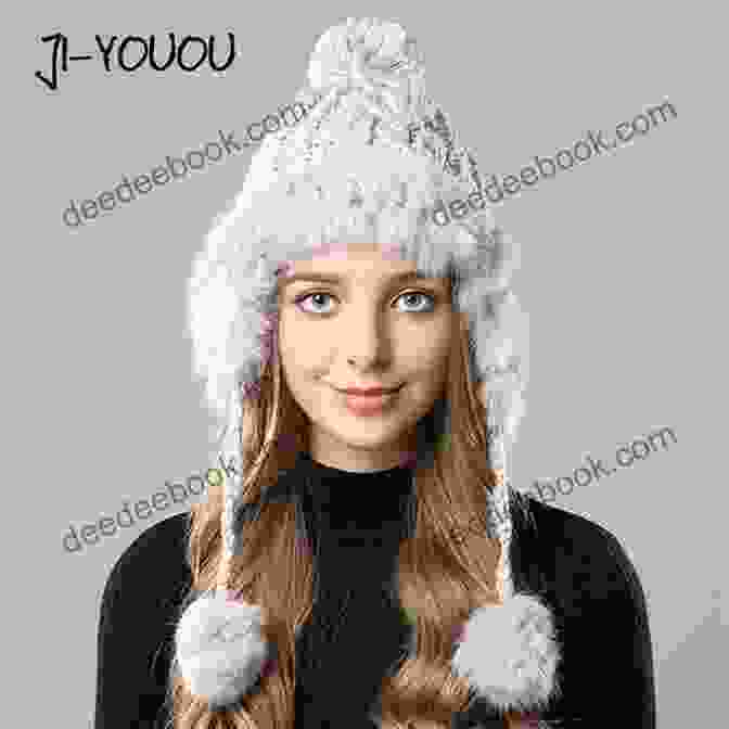 A Crocheted Winter Hat In A Soft Gray Yarn, Adorned With A Faux Fur Pompom And Ear Flaps For Added Warmth. Simple Hat Crochet Stitches: Hat Crochet Patterns And Instructions