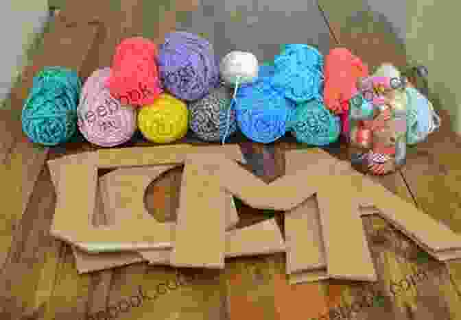 Photo Of Several Yarn Wrapped Letters, Each Decorated With A Different Color And Type Of Yarn. Make Stitch Knit For Baby: 35 Super Cute And Easy Craft Projects